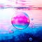 Background with soap bubbles, shimmering pink and blue and reflecting the sky, above the serene water surface