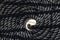 Background spiral of a black rope