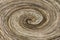 Background spiral with thin fibers. Swirling brown background