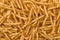 Background of stack of crispy french fries.