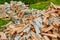 Background of a stack of split logs in a woodpile for use as domestic heating in winter