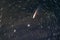 Background stars tracks comet deep space