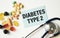 background a stethoscope with yellow list with text diabetes TYPE 2