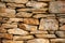 Background of stone wall texture of architecture in old town of Vela Luka, Korcula island, Croatia