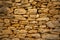 Background of stone wall texture of architecture in old town of Vela Luka, Korcula island, Croatia