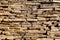 Background of stone wall texture. The surface of the stones is brown