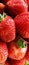 Background of strawberries, vertical image