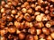 Background - strongly roasted nuts.