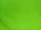 The background surface of the bright green canvas fabric
