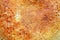 Background from the surface of a ruddy pancake close-up.