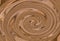 Background swirling. whirlpool brown texture melted cream color natural