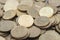 Background of ten-ruble coins on the surface close-up. Macro shot of Russian green coins