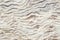 Background textural of asymmetric drawing. Natural texture travertine Pamukkale.