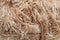 Background texture of beige nylon or acrylic yarn with a long thick pile for knitting handmade or hobby resembles grass