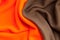 Background texture of bright orange and brown fleece