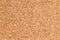 Background texture of fine ground brown bulgur