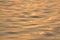 Background Texture of flowing Ganges river waters at sunrise