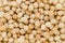 Background texture of fresh natural macadamia nuts