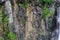 Background texture of a gray brown stone on the rock of the mountain discovered during archaeological excavations as a monument to