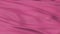 A background texture of hot pink fabric textile,seamless looping