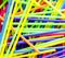 Background texture-jumbled pile of colorful plastic straws