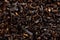Background texture of loos leaf English breakfast black tea from India.Macro