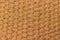 Background texture of natural material matting, cannabis hemp fiber. Material woven from natural hemp. Texture yellow brown beige