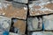 Background and texture of old broken painted cement building blocks