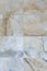 Background with a texture of old marble. The wall is tiled with natural stone.