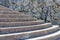 Background texture, old Stone wall and concrete semicircular stairs