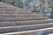 Background texture, old Stone wall and concrete semicircular stairs