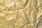 Background texture, pattern. Dense cotton fabric with gold color