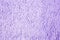 Background with texture of purple terry cloth.