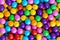Background texture of rainbow colored sugar candy