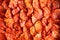 Background texture of ripe red sundried tomatoes