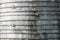 Background texture showing strapping over concrete on a silo