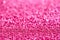 Background texture of sparkling pink glitter