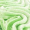 Background texture of swirled green ice cream