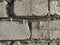 background texture of a wall of white brick close-up neat seams of cement