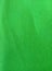 The background texture of wavy green polyester fabric