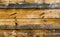 Background texture weathered wooden wall with charred spots