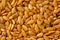 Background texture of white flax seeds. Useful cereals.