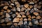 Background with textured firewood stack, ready for cozy fireplace warmth