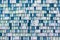 Background tile mosaic of small cubes of blocks of white and blue
