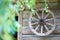 Background with a tree and a wheel. Russia . village