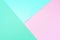 Background in trendy green and pink colors. Fashionable paper. Top view. Minimal concept. Trendy mint color