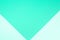 Background in trendy mint color. Fashionable mint paper. Top view. Minimal concept. Green and turquoise color