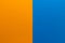 Background of two vertical rectangles blue and orange. Sheets of blank blue and orange paper with fine texture, split vertically,