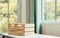 Background of two wooden carton crate or box put on table beside window in indoor comfortable kitchen at home with copy space,