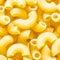 Background from uncooked chifferini rigati pasta